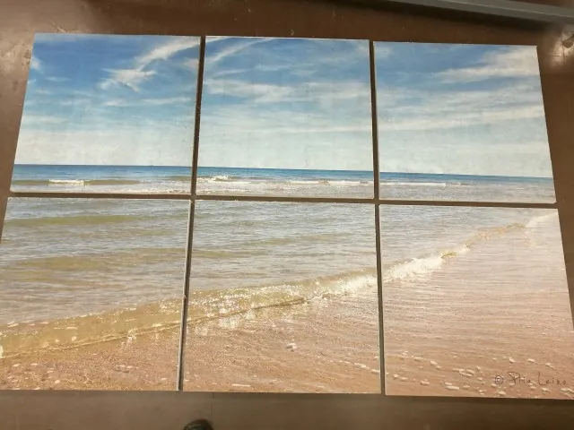 Kuuest fototrükiga akustilisest plaadist koosnev rannapilt